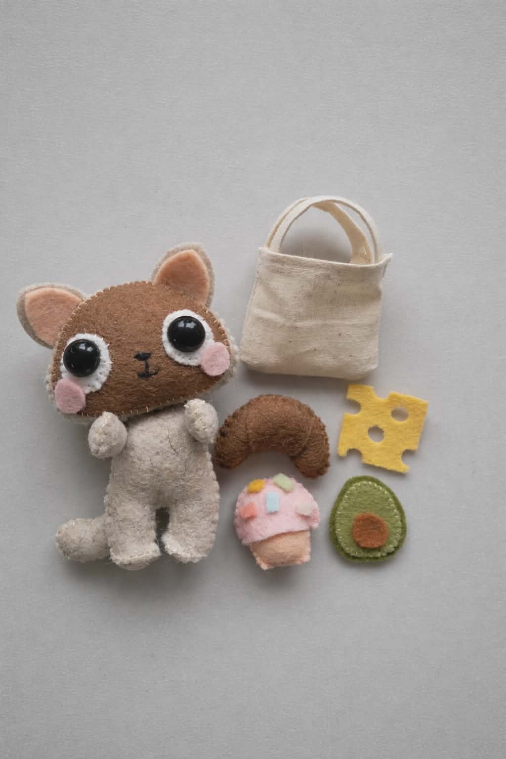 Cat plushie with felt foods