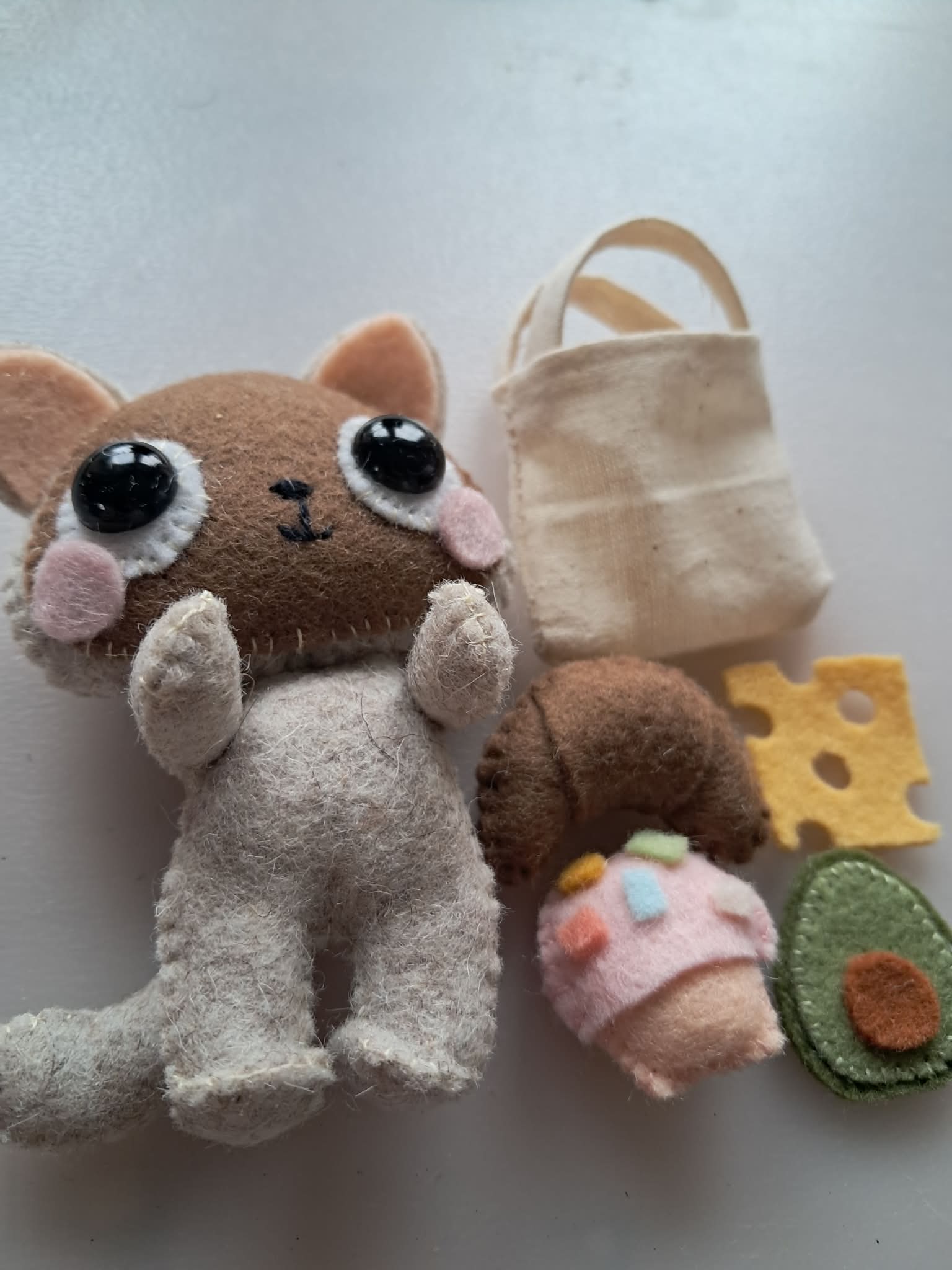 Cat plushie with felt foods
