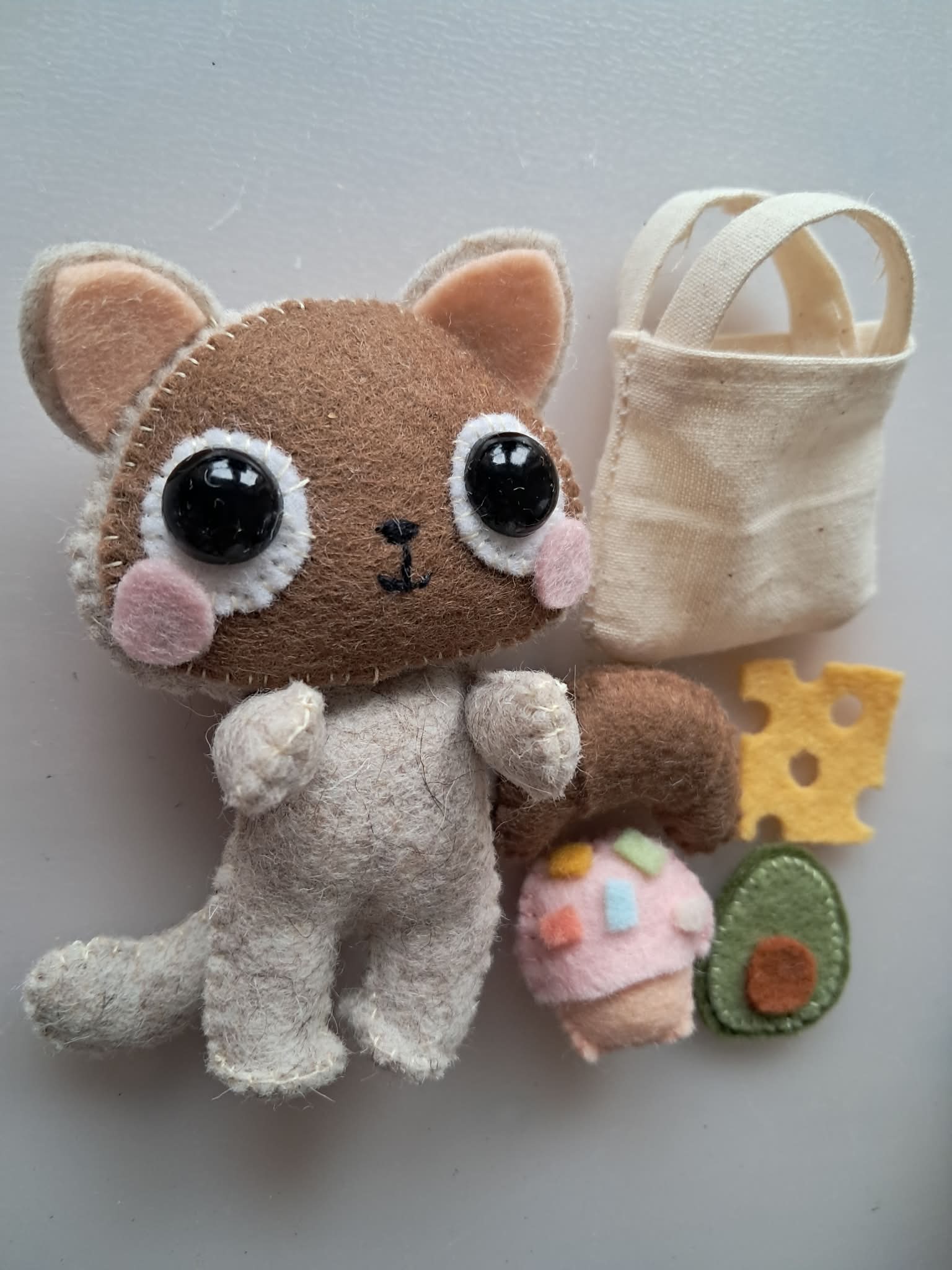Cat plushie with felt foods